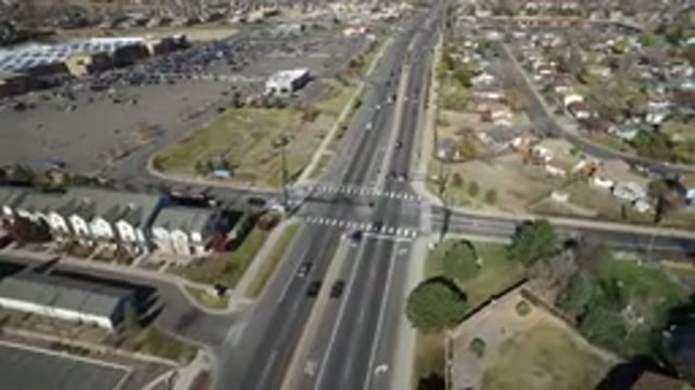 HIDDEN LAKE COLORADO-2016: Top View Of The City Very Wooded Many Houses Paved