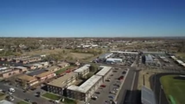 WESTMINSTER COLORADO-2016: Air Filming A City With Houses Streets Stadium And A