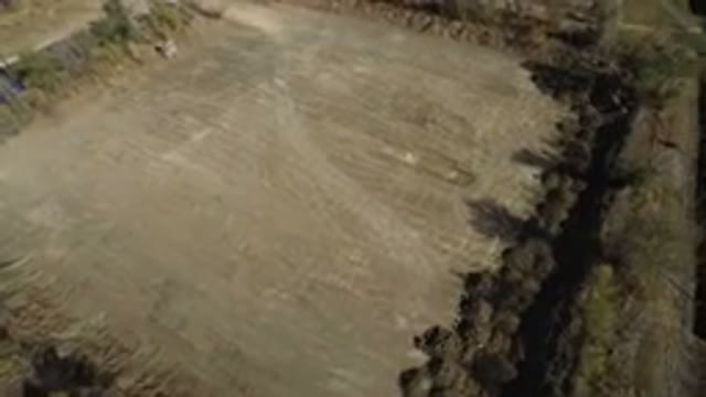 WESTMINSTER COLORADO-2016: Aerial View Of A Plot Of Dirt Surrounded By Trees And