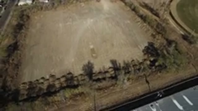WESTMINSTER COLORADO-2016: A Large Dirt Field From A Birds Eye View With A Road