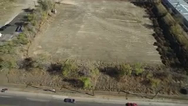 WESTMINSTER COLORADO-2016: Aerial Filming of a Landmark Near a Street with Cars
