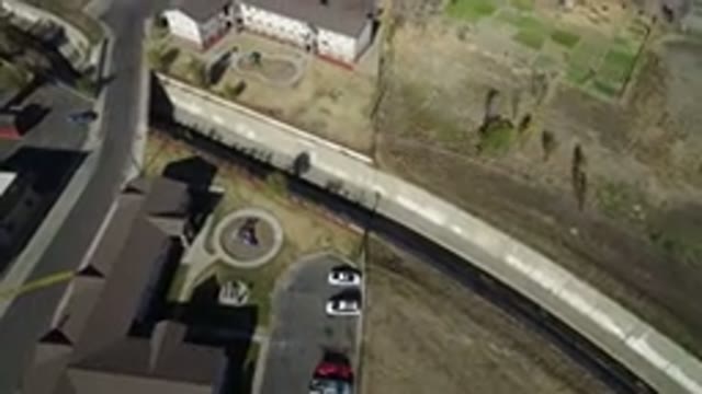 WESTMINSTER COLORADO-2016: Aerial View of Road Bridge Near Large White Building
