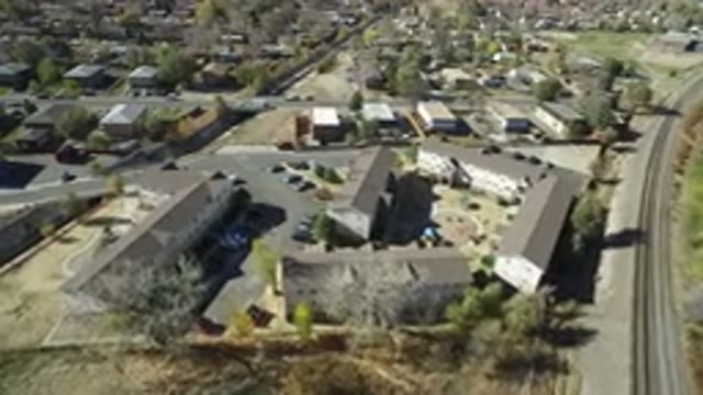 WESTMINSTER COLORADO-2016: Drone Footage Of Large Building Next To Residential Area