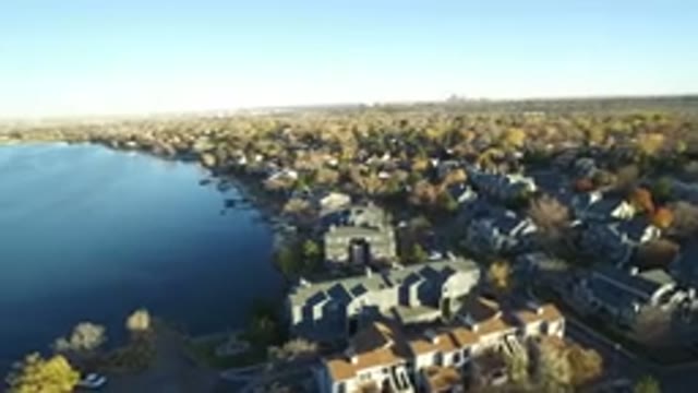 WESTMINSTER COLORADO-2016: Serene Lakeside Neighborhood With Green Trees And Blue Sky