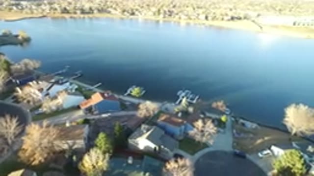 WESTMINSTER COLORADO-2016: Panning Aerial View Of Beautiful Sunny Lakeside