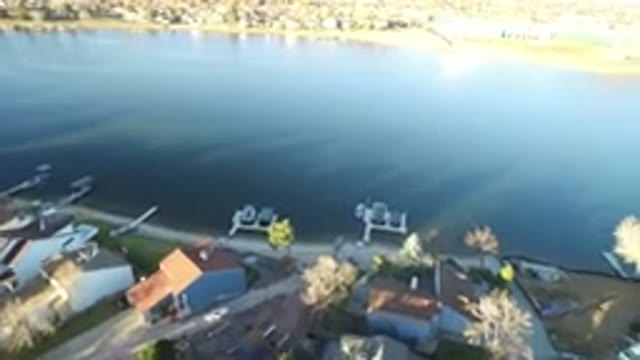WESTMINSTER COLORADO-2016: Aerial Footage Of A Large Body Of Water With Big Houses