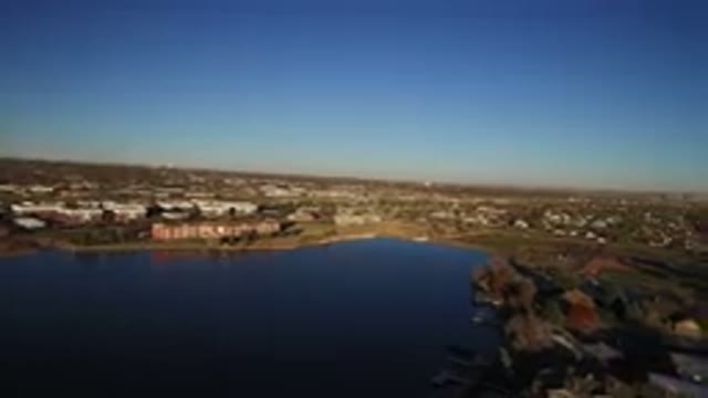 WESTMINSTER COLORADO-2016: Body Of Water Near Buildings On A Clear Day With No