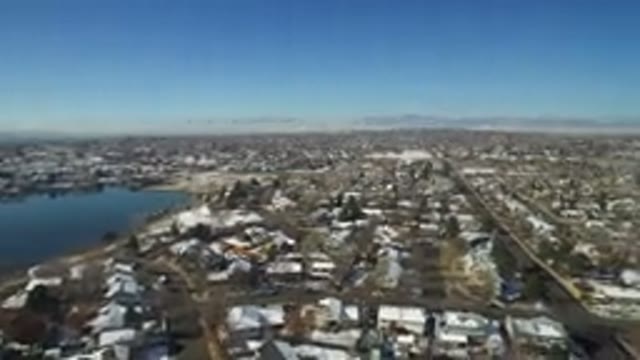HIDDEN LAKE COLORADO-2016: A Lake Sits In A Built-Up Area Filled With Single Family Homes