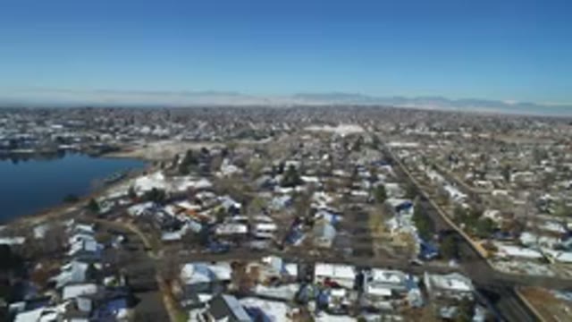 HIDDEN LAKE COLORADO-2016: Flying Drone Camera View Of Suburbs On A Cloudless Day