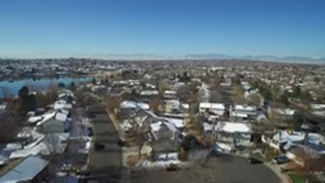 HIDDEN LAKE COLORADO-2016: Close Drone Shot Of Neighborhood Street With Crusades