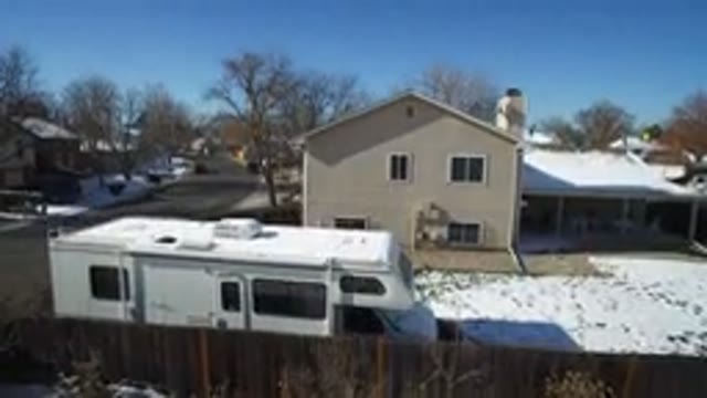 HIDDEN LAKE COLORADO-2016: Aerial View Of House With Van Trees And Roads