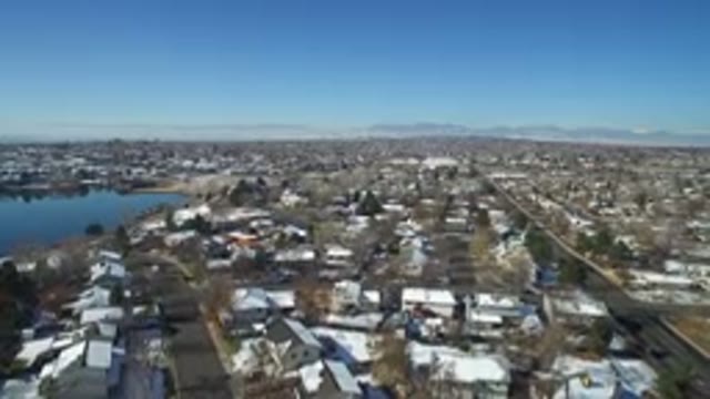 HIDDEN LAKE COLORADO-2016: Overview Of A City With Houses Nearby The Lake In The