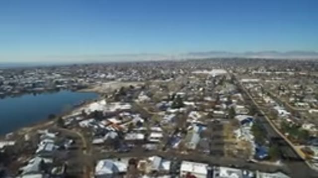 HIDDEN LAKE COLORADO-2016: Drone Shot Of Medium Sized Neighborhood With Lake On
