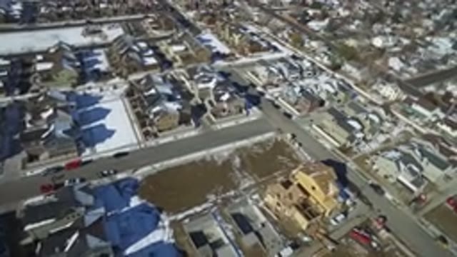 HIDDEN LAKE COLORADO-2016: Aerial View Of Terraced Houses And Snow-Covered Streets