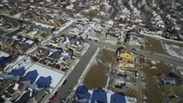 HIDDEN LAKE COLORADO-2016: Plane Flying Over Industrial Town With Buildings And