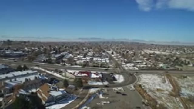 HIDDEN LAKE COLORADO-2016: Aerial Footage Of A Large City With Traffic Going
