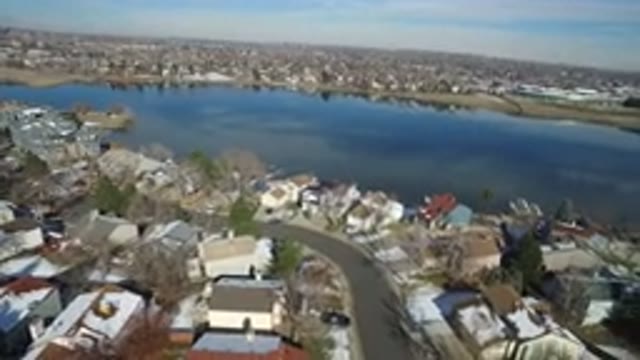 HIDDEN LAKE COLORADO-2016: A Very Beautiful View Of A Neighborhood With Several Houses And Lake
