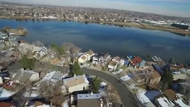 HIDDEN LAKE COLORADO-2016: Aerial View From Helicopter Of A City With A River