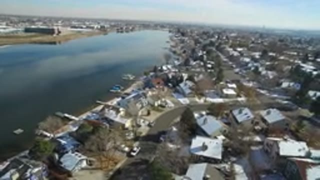 HIDDEN LAKE COLORADO-2016: Air Footage Of A Town At The Shore Of A Big And Long Lake