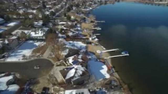 HIDDEN LAKE COLORADO-2016: City Built On The Banks Of A River With Waters That Reflect The Sky