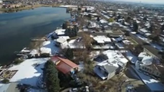 HIDDEN LAKE COLORADO-2016: Aerial View of Houses Near a Large Pond