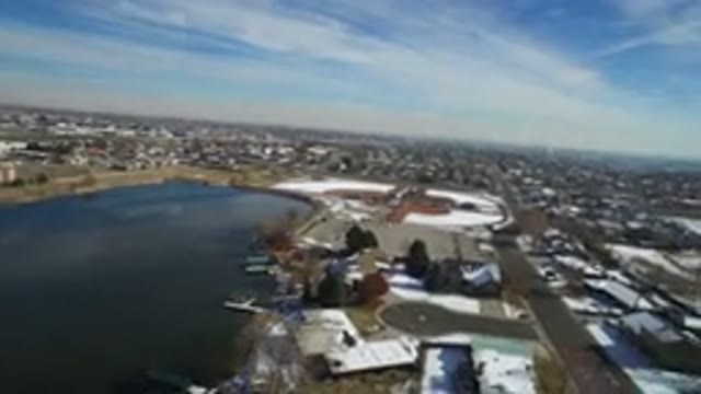 HIDDEN LAKE COLORADO-2016: An Aerial View Of A Lake In An Urban Area In Winter