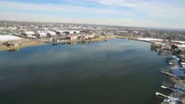 HIDDEN LAKE COLORADO-2016: Aerial Drone Shot Of A Town And Its Lake