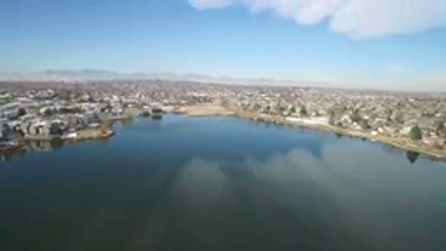 HIDDEN LAKE COLORADO-2016: Top View Of A City With A Blue Sky With Clouds At