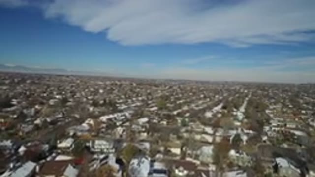 HIDDEN LAKE COLORADO-2016: Plane Flying Above City With Virgules People And