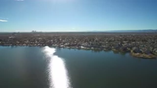 WESTMINSTER COLORADO-2016: Avila Footage Over A Calm Lake In Spring Near A