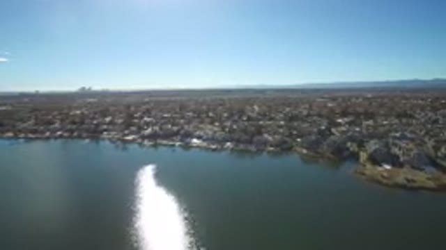 WESTMINSTER COLORADO-2016: Houses Stand Side By Side Near The Clear Waters Of A