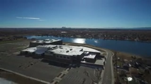 WESTMINSTER COLORADO-2016: Flying Image Of A Sport Center And School Next To A Field