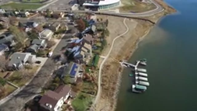 WESTMINSTER COLORADO-2016: Aerial Footage Of A Large City Near A Big Body Of Water