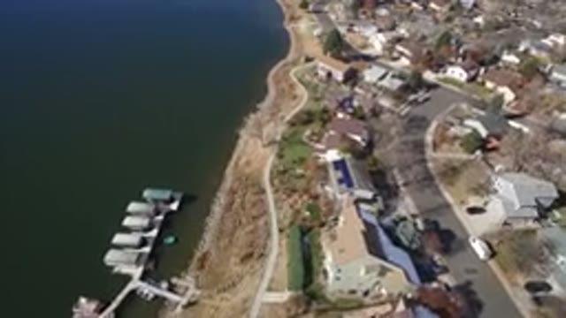WESTMINSTER COLORADO-2016: Riverside With Houses Close To The Shores And Boathouses
