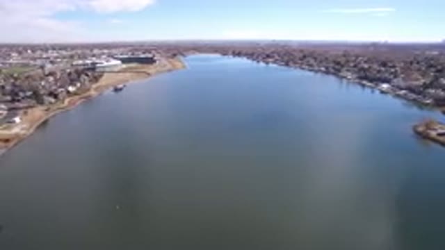 WESTMINSTER COLORADO-2016: A High View Of A River Separating Two Bodies Of Land