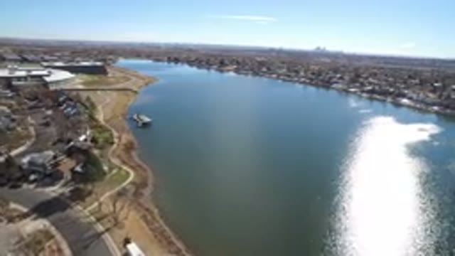 WESTMINSTER COLORADO-2016: A Moving Aerial View Shot Of A City's River On A