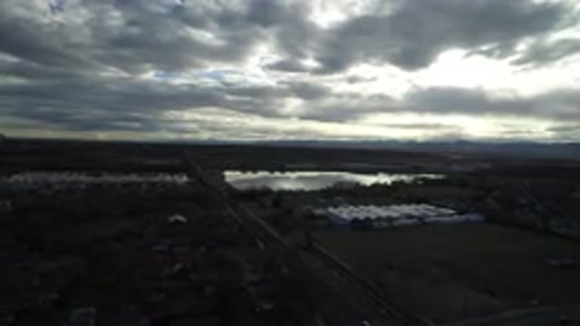 WESTMINSTER COLORADO-2016: Cloudy Landscape Near a Stream