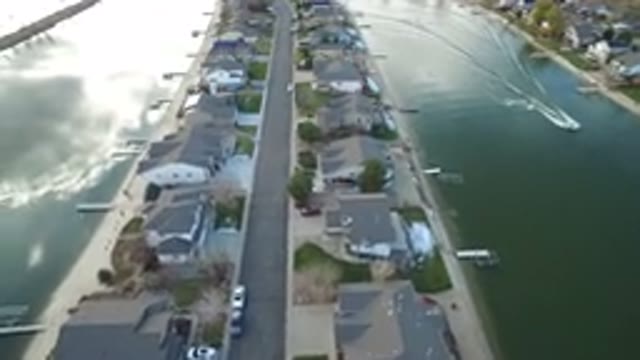 WESTMINSTER COLORADO-2016: A White Boat Sailing on a River