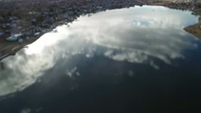 WESTMINSTER COLORADO-2016: Aerial View Of Water Reflecting Clouds