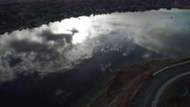 WESTMINSTER COLORADO-2016: Aerial Shot Of A Winding Road Going By A River