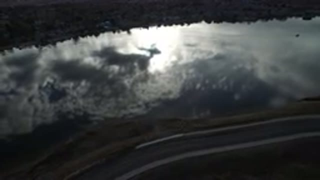 WESTMINSTER COLORADO-2016: Drone Footage Of A Large River Where The Clouds Are Reflected