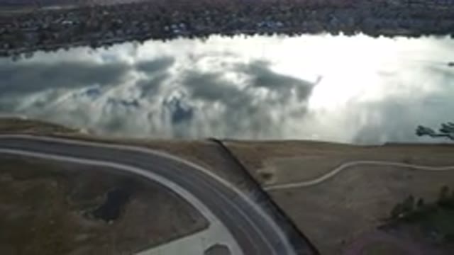 WESTMINSTER COLORADO-2016: Daytime Aerial View Of Water And Road With Clouds