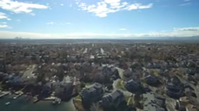 WESTMINSTER COLORADO-2016: Drone Flying Over City Showing Houses Streets Live