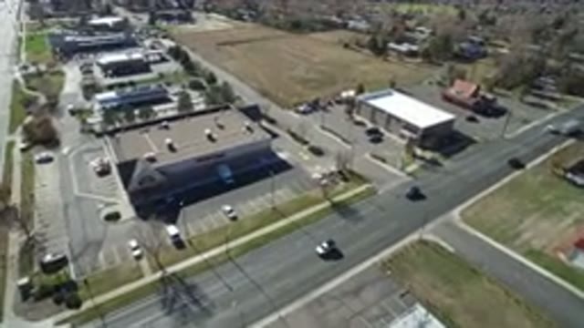 WESTMINSTER COLORADO-2016: Fly Over Footage Of Small Town Showing Businesses And Buildings