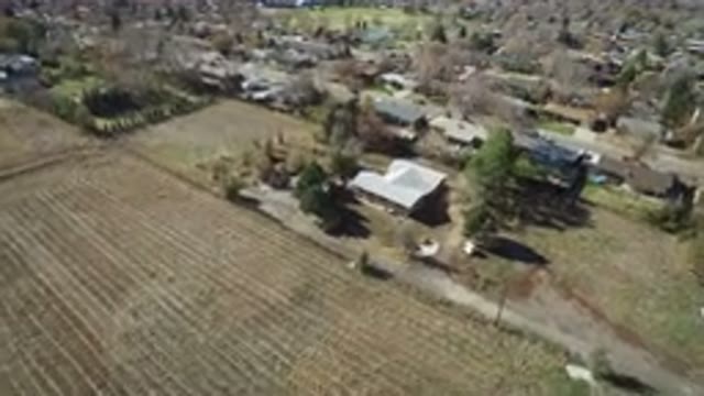 WESTMINSTER COLORADO-2016: Aerial Footage Of A Large Town With A Plowed Field