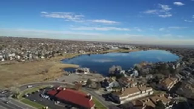 WESTMINSTER COLORADO-2016: Large Suburb Main Store Under Clear Blue Sky with Cars on Highway