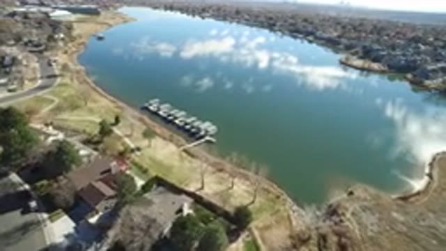 WESTMINSTER COLORADO-2016: Aerial Shot Of Lake With Moorings Buildings Grass