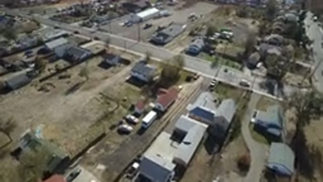 WESTMINSTER COLORADO-2016: Aerial Video Of Cars Traveling On A Road With Farms And Buildings