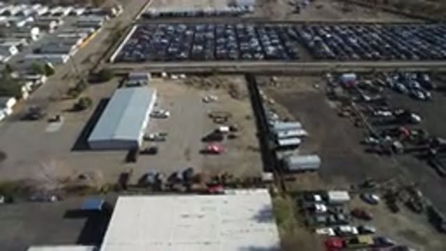 WESTMINSTER COLORADO-2016: Flying Over Factory With Parked Cars