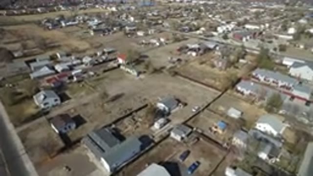 WESTMINSTER COLORADO-2016: Moving Aerial Shot of Small Clumps of Houses and Roads